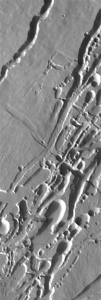 Collapsed lava tubes on Pavonis Mons (THEMIS_IOTD_20171030)