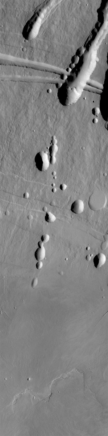 Collapse chains and pits on Arsia Mons (THEMIS_IOTD_20180101)