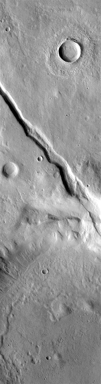 Faults cut a crater in Claritas Fossae (THEMIS_IOTD_20181207)