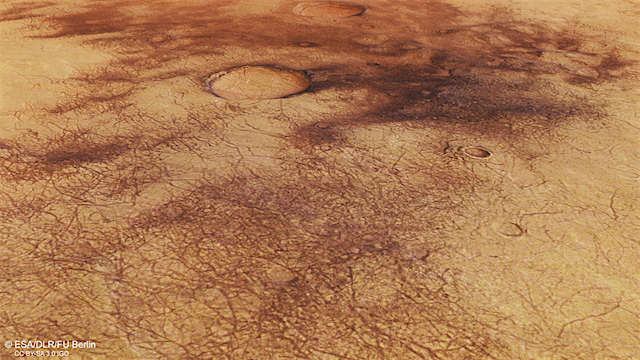 Perspective_view_of_the_dust_devils_of_Chalcoporos_Rupes